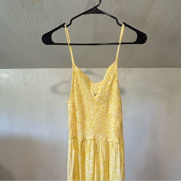 Revolve Sincerely Jules Yellow Spaghetti Strap Floral Flare Leg Jumpsuit - Picture 3 of 9